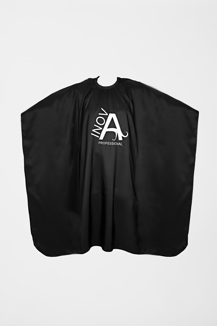 Inova Professional hair styling cape with elastic hook closure for salon use